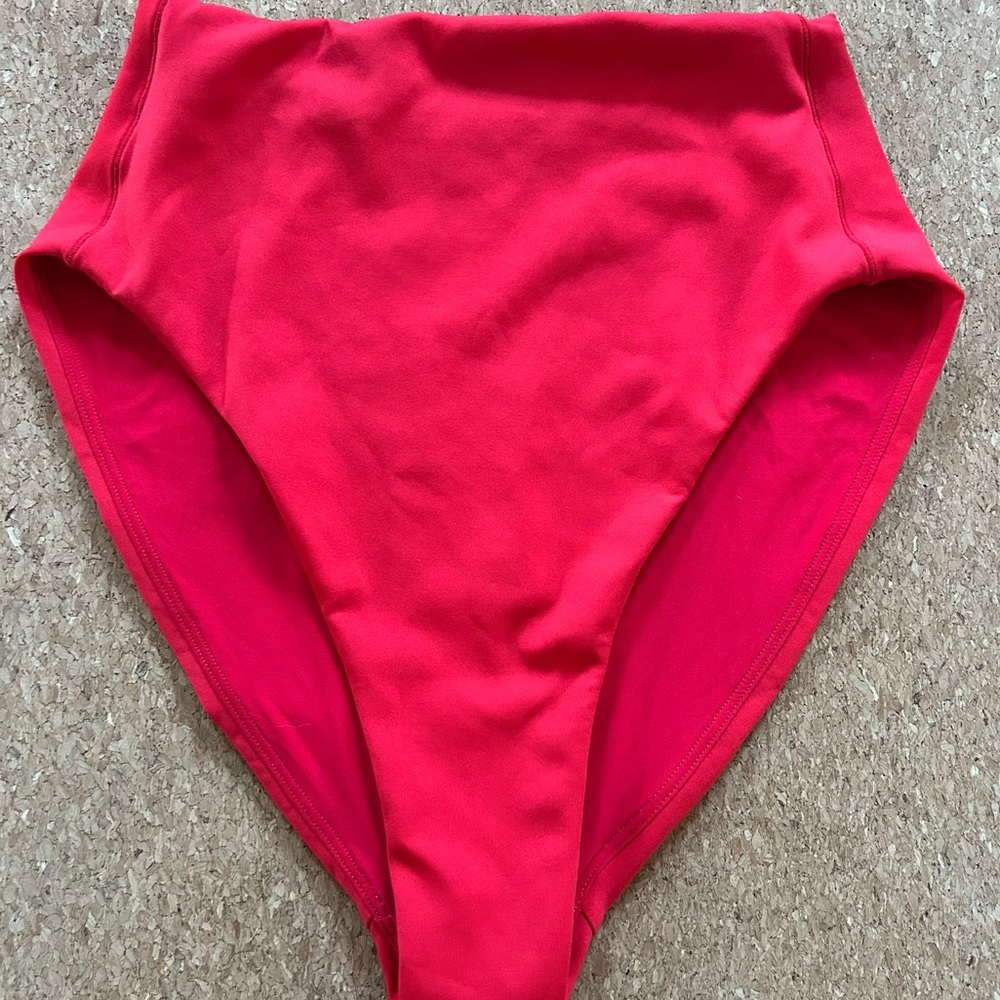 Left on Friday Hi Tide bottom size small sweet chili red